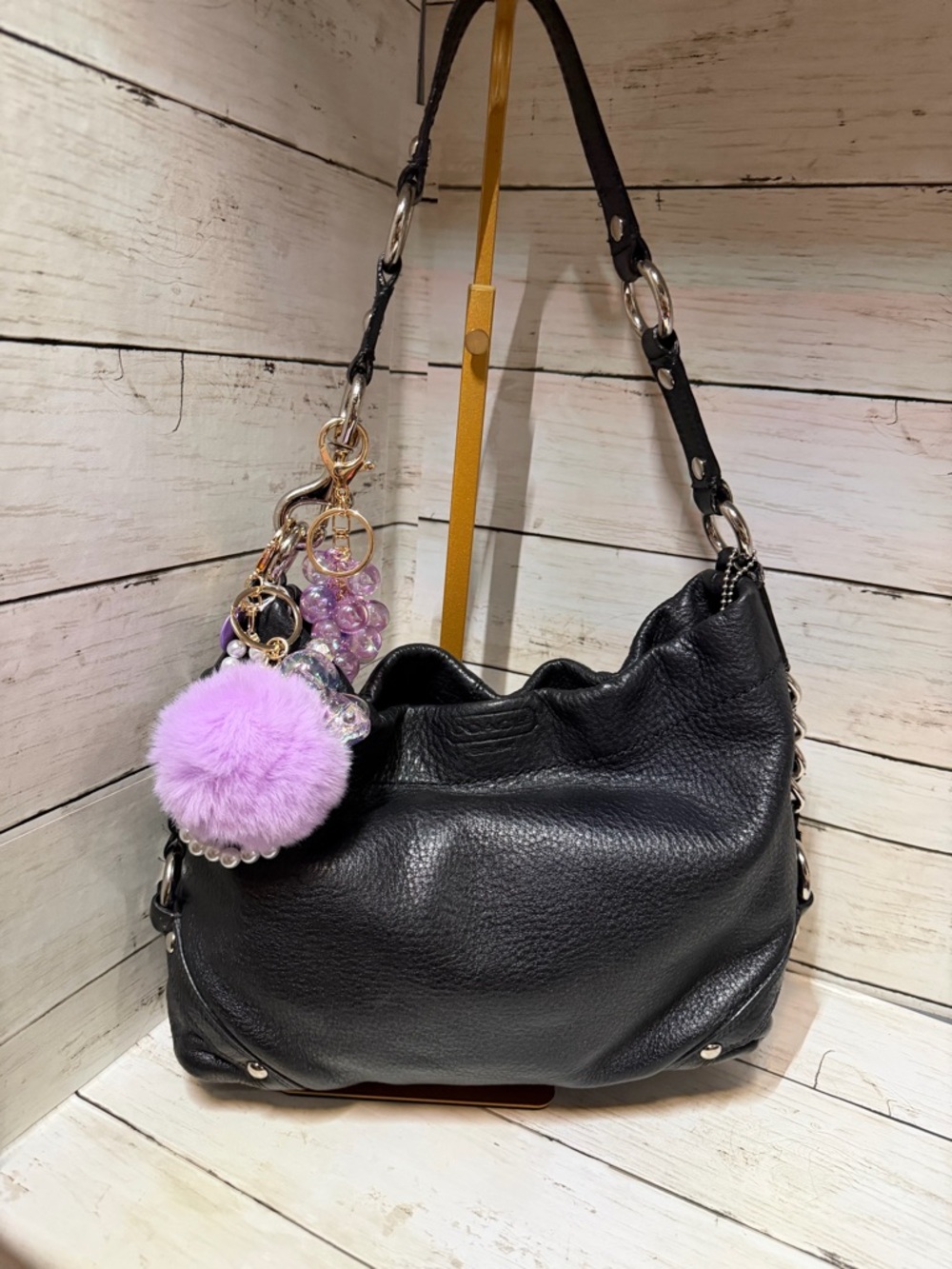 Coach Carly Black Leather Shoulder Bag with Lavender Pom Charm